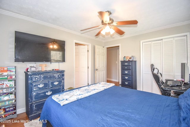 241 Warrior Rd, Alexander City, AL 35010 - bedroom featuring wood finished floors, baseboards, a ceiling fan, ornamental molding, and a closet