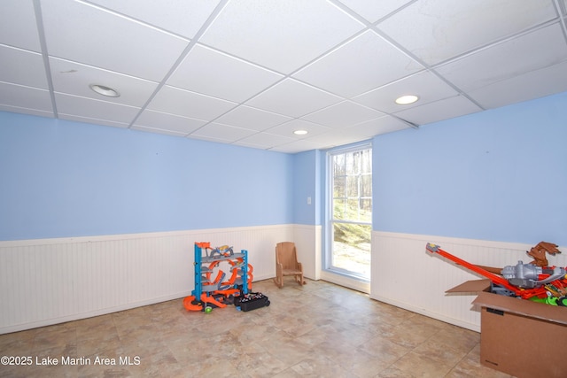 241 Warrior Rd, Alexander City, AL 35010 - rec room with recessed lighting, a paneled ceiling, and wainscoting
