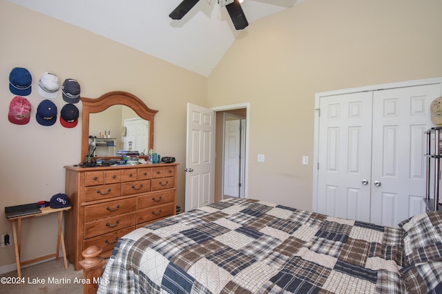 carpeted bedroom featuring ceiling fan, high vaulted ceiling, and a closet