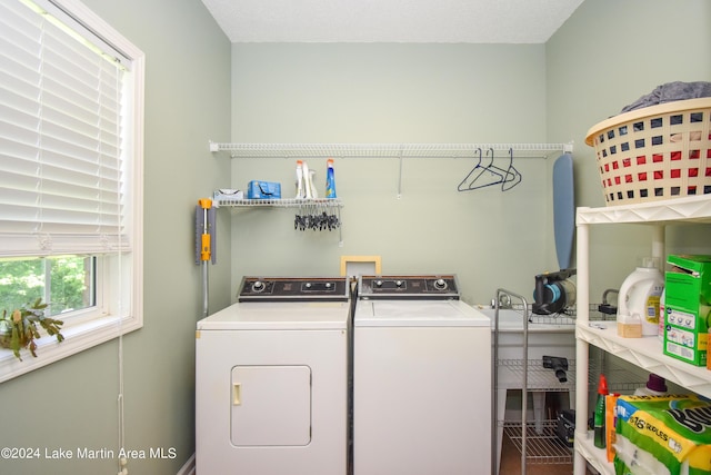 laundry area with separate washer and dryer