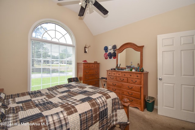 carpeted bedroom featuring ceiling fan and lofted ceiling