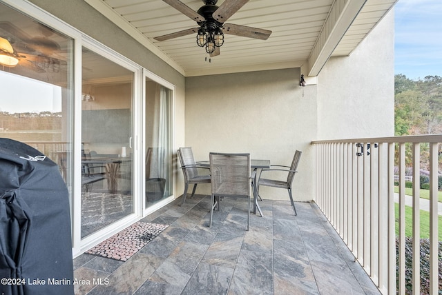 balcony featuring ceiling fan