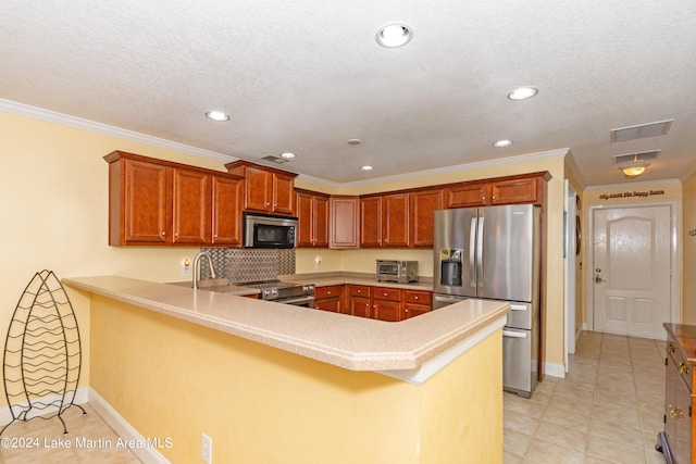 kitchen with kitchen peninsula, crown molding, decorative backsplash, light tile patterned flooring, and appliances with stainless steel finishes