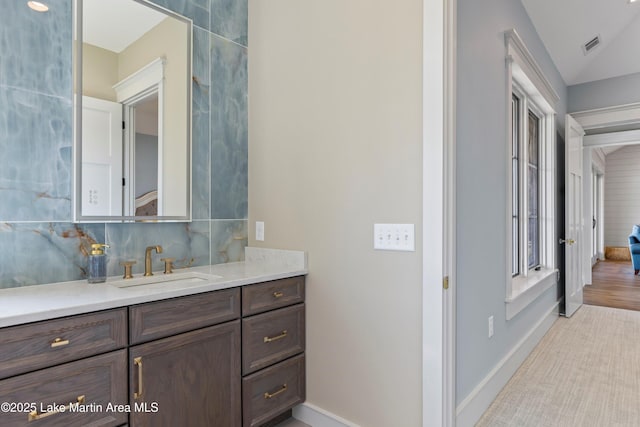 116 Water Oak Ln, Jacksons Gap, AL 36861 - bathroom featuring vanity and decorative backsplash