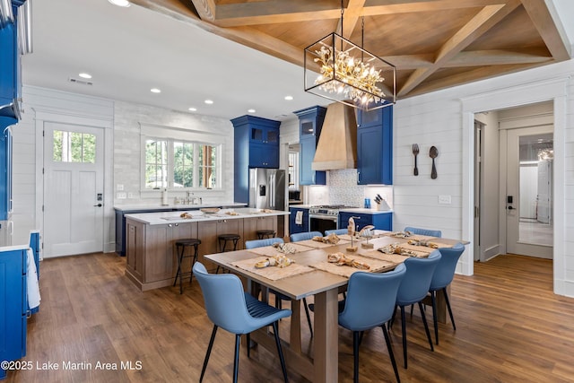 116 Water Oak Ln, Jacksons Gap, AL 36861 - dining room with coffered ceiling, dark wood finished floors, a chandelier, recessed lighting, and beamed ceiling