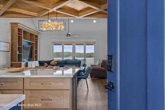 116 Water Oak Ln, Jacksons Gap, AL 36861 - kitchen with wood finished floors, wood walls, coffered ceiling, light countertops, and ceiling fan