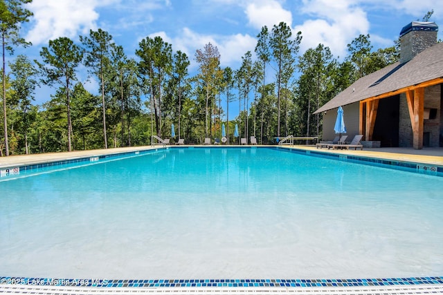 pool with a patio