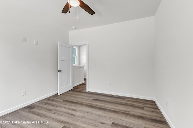 189 Magnolia Way, Dadeville, AL 36853 - empty room with a ceiling fan, wood finished floors, and baseboards