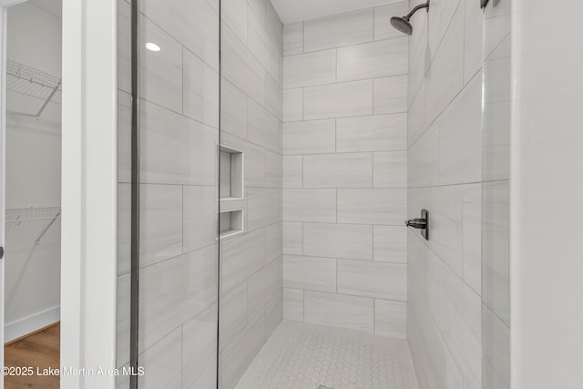 189 Magnolia Way, Dadeville, AL 36853 - full bathroom featuring a shower stall and a walk in closet