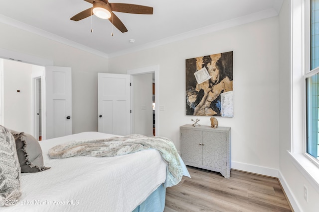 189 Magnolia Way, Dadeville, AL 36853 - bedroom with crown molding, light wood-type flooring, baseboards, and ceiling fan