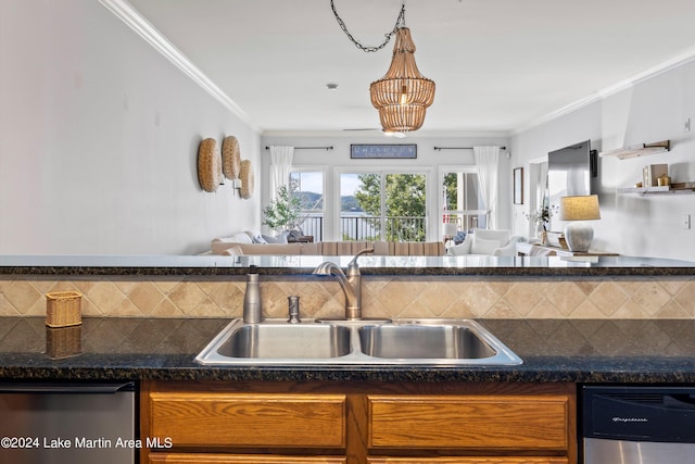 kitchen featuring crown molding, stainless steel dishwasher, and sink