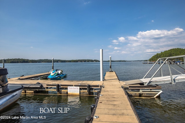 view of dock with a water view