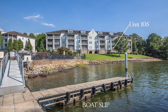 dock area featuring a water view