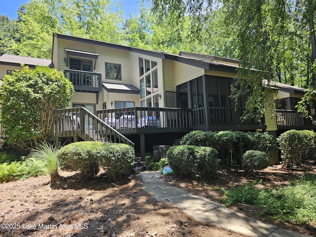 67 Lakeview Dr Unit 10H, Alexander City, AL 35010 - view of front facade featuring a sunroom, a deck, and stairway