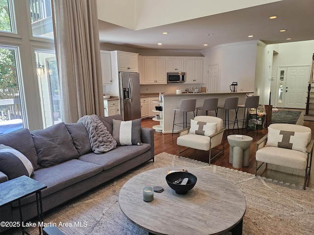 67 Lakeview Dr Unit 10H, Alexander City, AL 35010 - living room with dark wood-style floors, ornamental molding, and recessed lighting