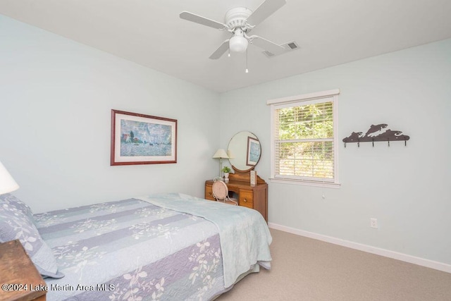 bedroom featuring ceiling fan and carpet floors