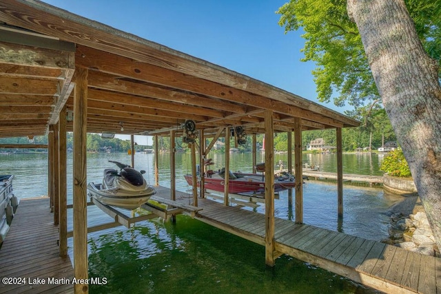 dock area featuring a water view