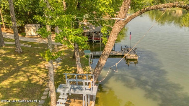 drone / aerial view featuring a water view