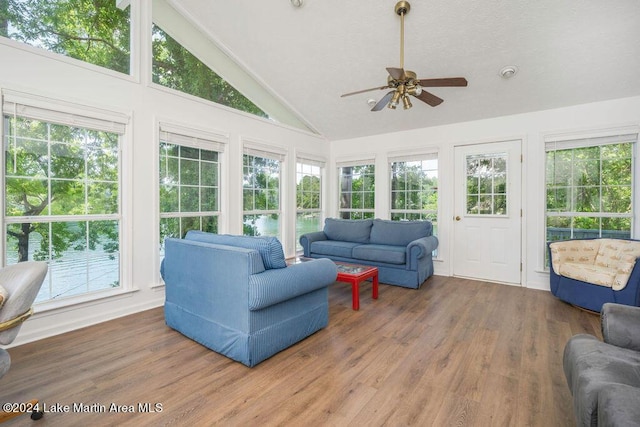 sunroom with lofted ceiling and a wealth of natural light