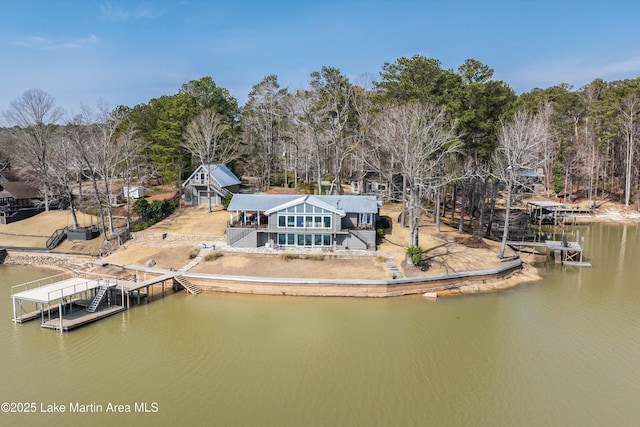 view of dock featuring a deck with water view