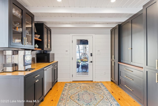 interior space with wooden ceiling, dishwasher, light wood-style flooring, and beamed ceiling