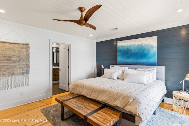 bedroom featuring wooden ceiling, ceiling fan, baseboards, and wood finished floors