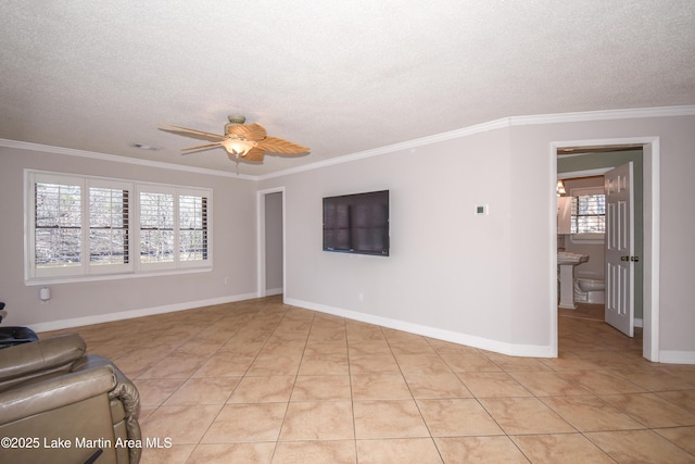 unfurnished living room featuring ornamental molding, light tile patterned flooring, ceiling fan, and a textured ceiling