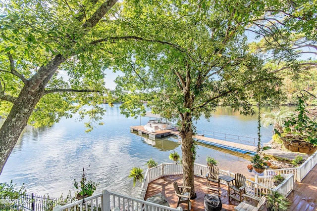 water view with a floating dock