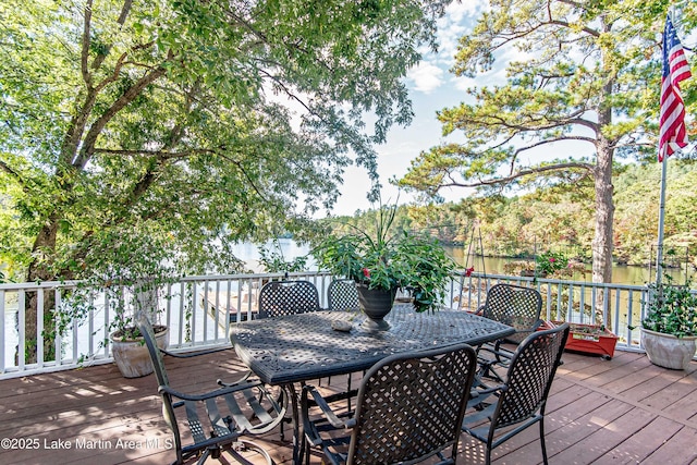 deck featuring outdoor dining area