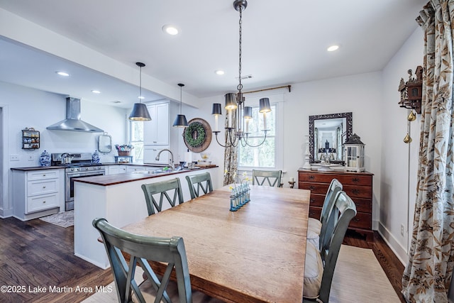 dining space with recessed lighting, dark wood-style floors, and visible vents