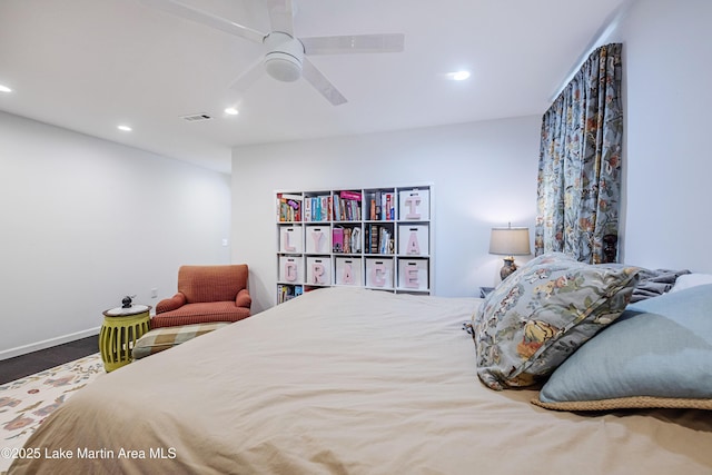 carpeted bedroom featuring recessed lighting, visible vents, baseboards, and ceiling fan