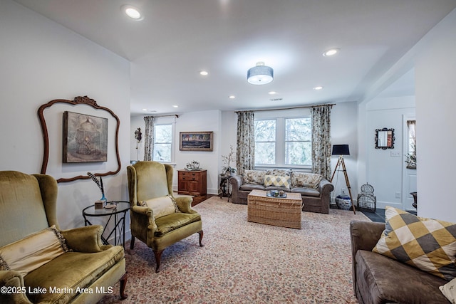 living room with recessed lighting and baseboards