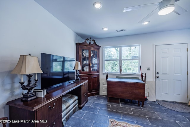 office area with recessed lighting and visible vents