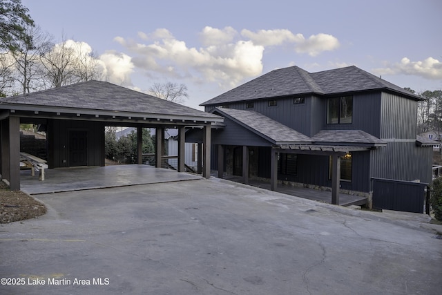 exterior space with a carport