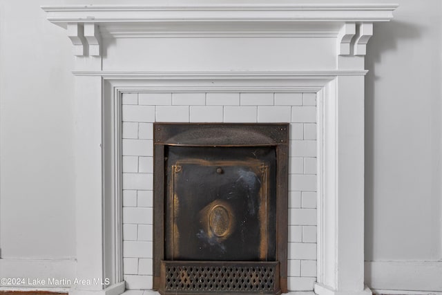 room details featuring a fireplace