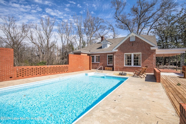 view of pool featuring a patio