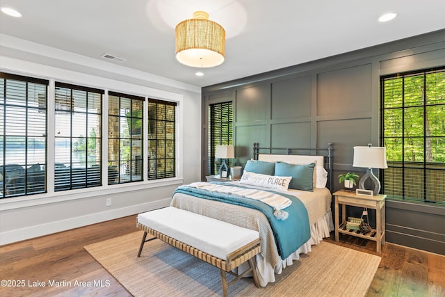 bedroom featuring hardwood / wood-style floors