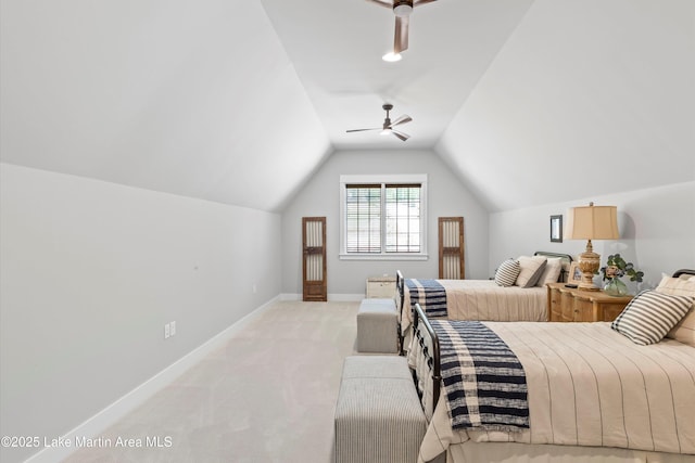 carpeted bedroom featuring lofted ceiling