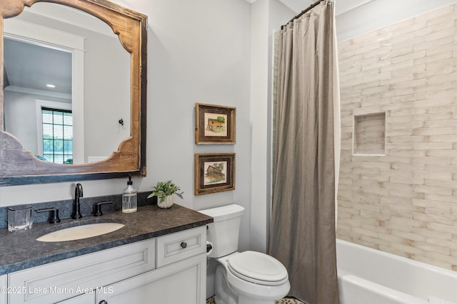 full bathroom with shower / bath combo with shower curtain, vanity, and toilet