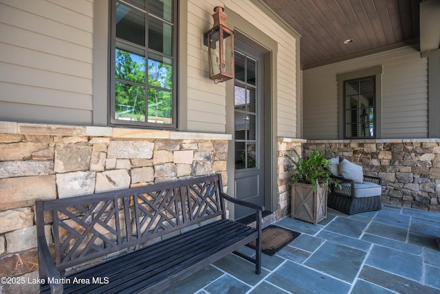 doorway to property featuring a porch