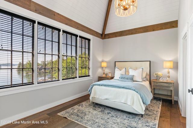 bedroom featuring beamed ceiling, high vaulted ceiling, dark wood-type flooring, and a notable chandelier