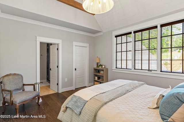 bedroom with dark wood-type flooring and vaulted ceiling