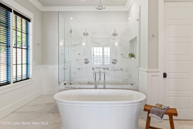 bathroom featuring independent shower and bath