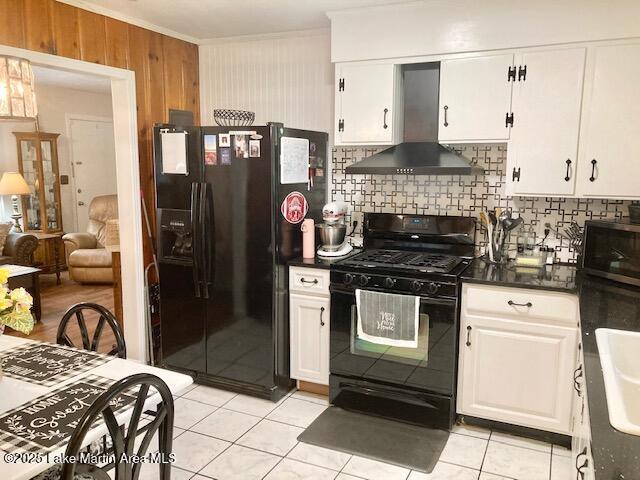 2030 Elkahatchee Rd, Alexander City, AL 35010 - kitchen featuring range hood, black appliances, tasteful backsplash, dark countertops, and ornamental molding