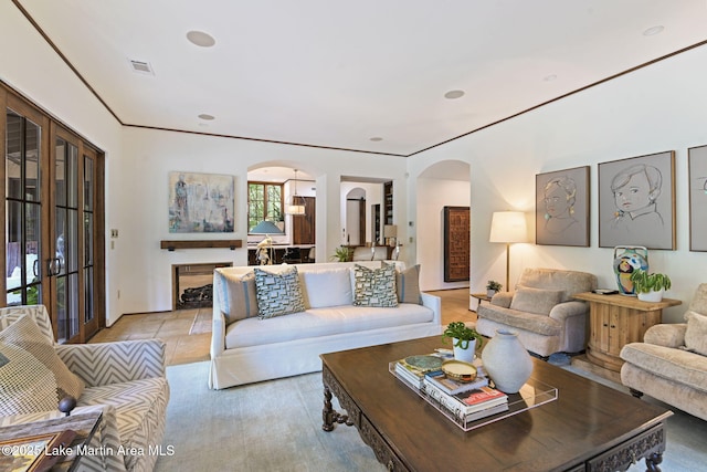 living area with arched walkways