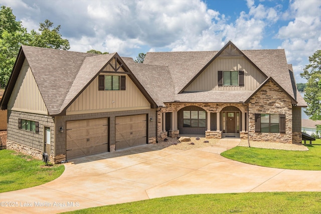 craftsman house with a garage, a front yard, and covered porch