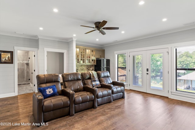 living room with french doors, wood-type flooring, and a wealth of natural light