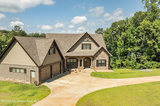 view of front of home featuring a garage and a front lawn