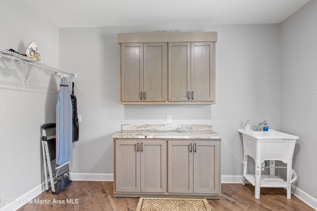 washroom featuring dark wood-type flooring