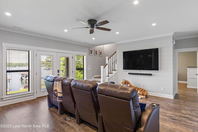 living room featuring french doors, ceiling fan, and dark hardwood / wood-style flooring